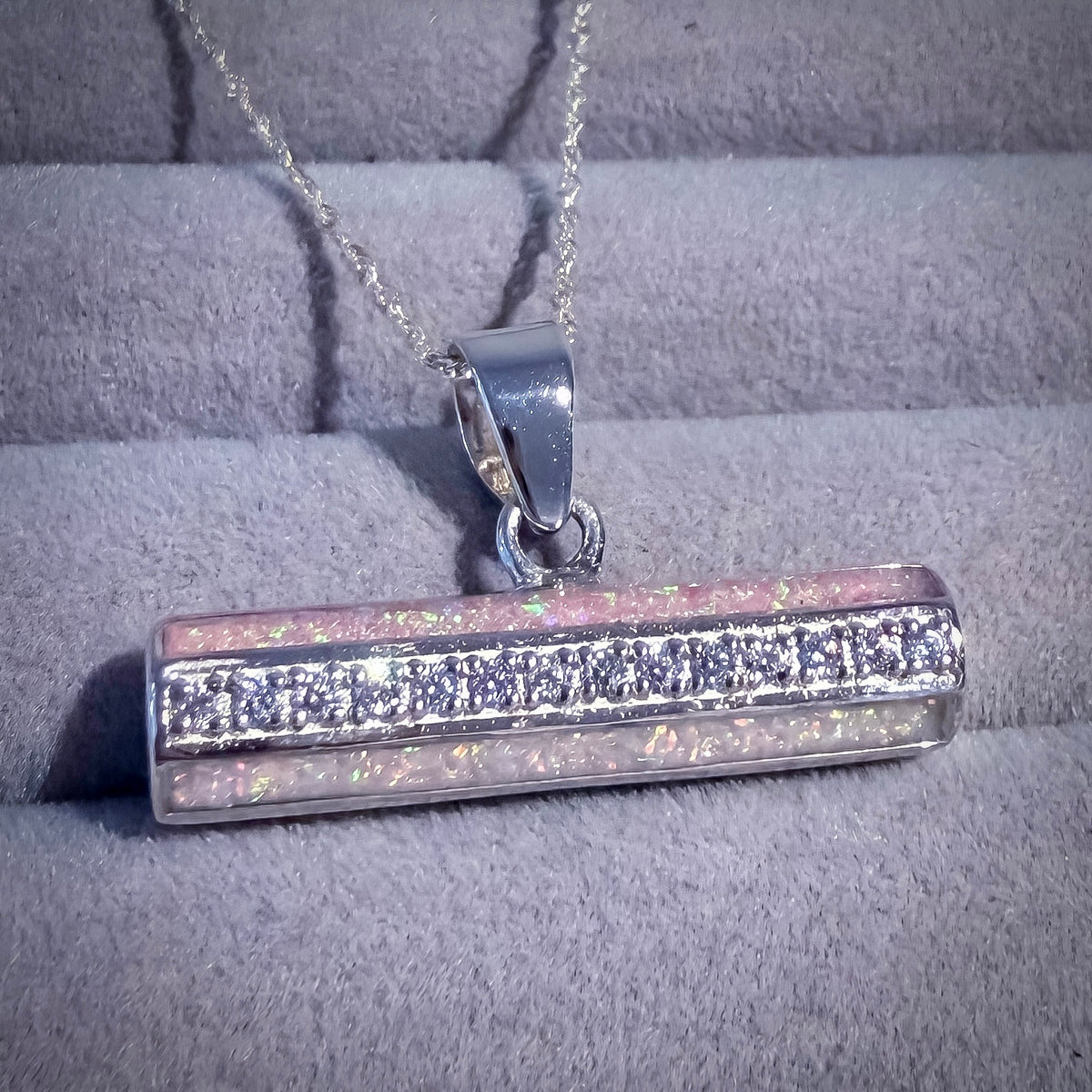Held Within T-Bar Pendant